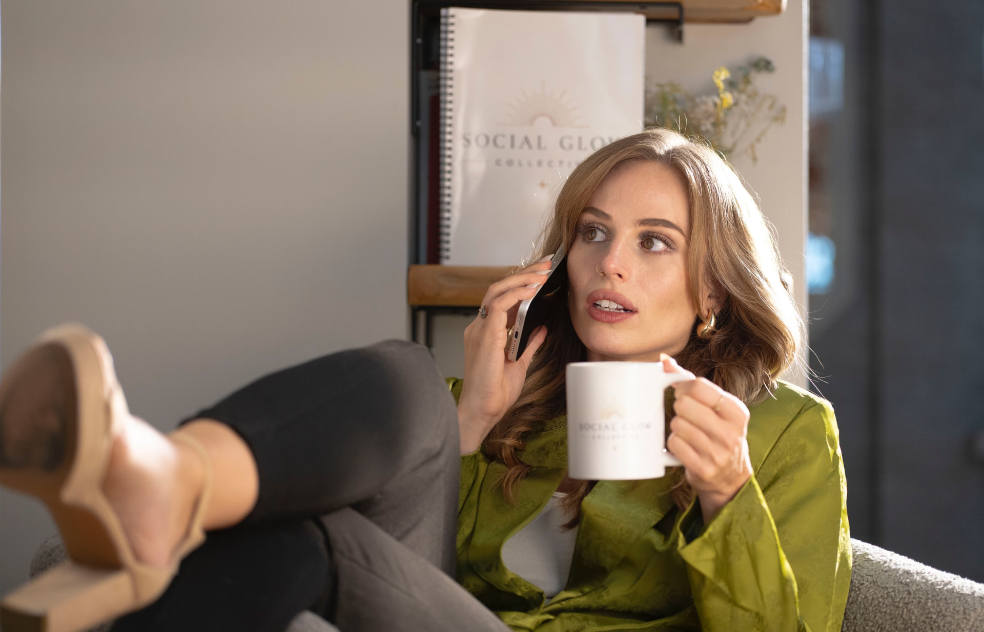 Mary Claire Materna on a strategy call with a Social Glow Collective mug